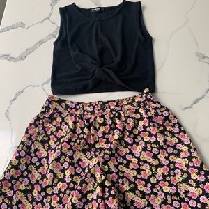Black cropped tank top and floral shorts